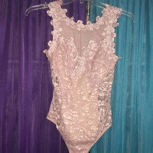Pink body suit